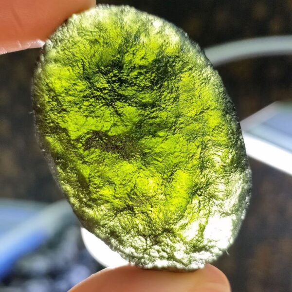 Green Glass Meteorite Shaped Energy Original Stone Men's And Women's Pendant Mineral Crystal
associated with the throat and heart chakras. They assist you in speaking from the heart. - Image 3