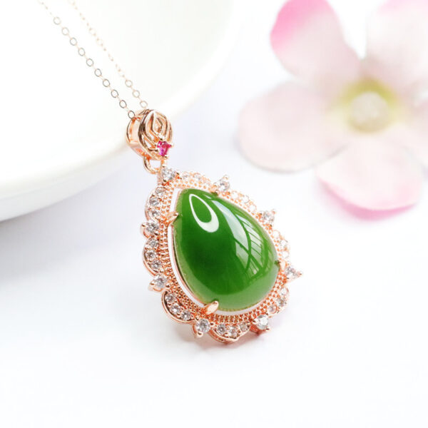 Natural Hetian Jade Pendant Jasper Water Drop Russian Material Spinach GreenIt is often used to symbolize power, grace, and purity and is seen as a charm of good fortune.