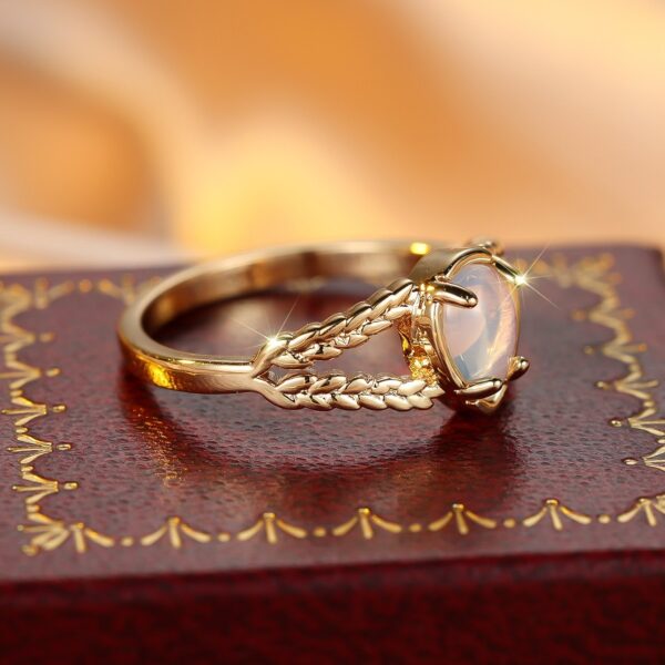 Round Golden Water Drop Protein Twist Hollow Ring - Image 3